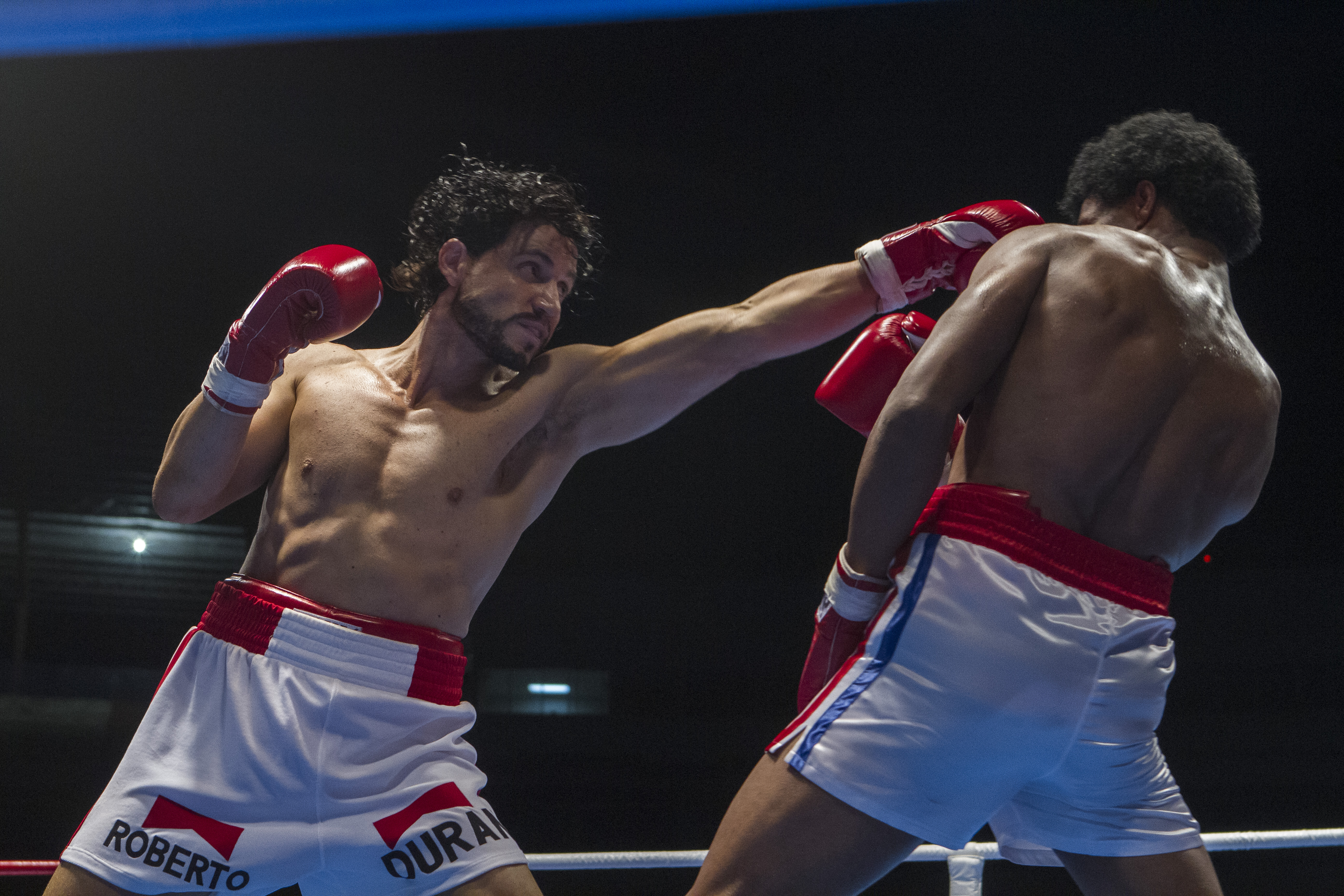 Image of two boxers in the ring from the film "Hands of Stone"