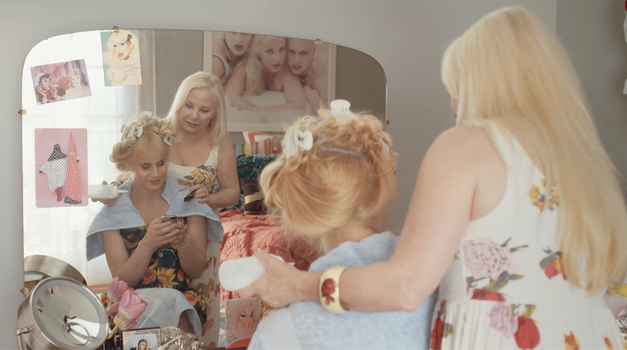 Image of two ladies in a salon with one lady getting her hair dyed