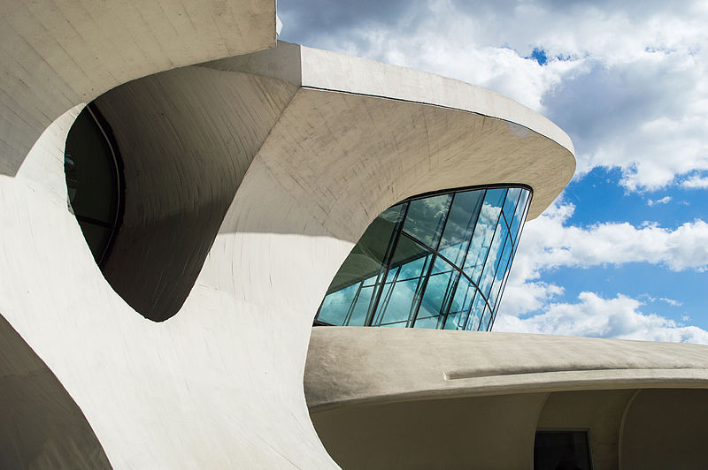TWA Flight Center exterior showing the concrete forms and large glass panels