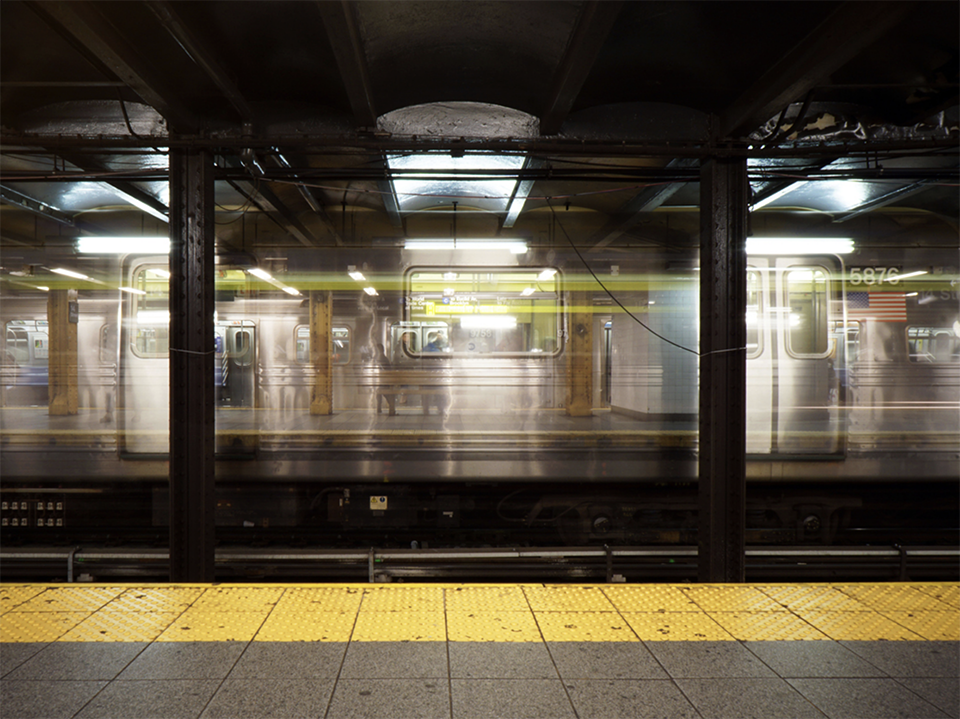 Photo of a subway station and train in New York City