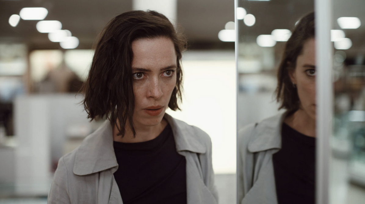 Still from Resurrection with Rebecca Hall looking at a mirror