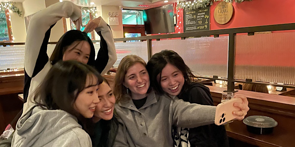 A group of friends take a selfie